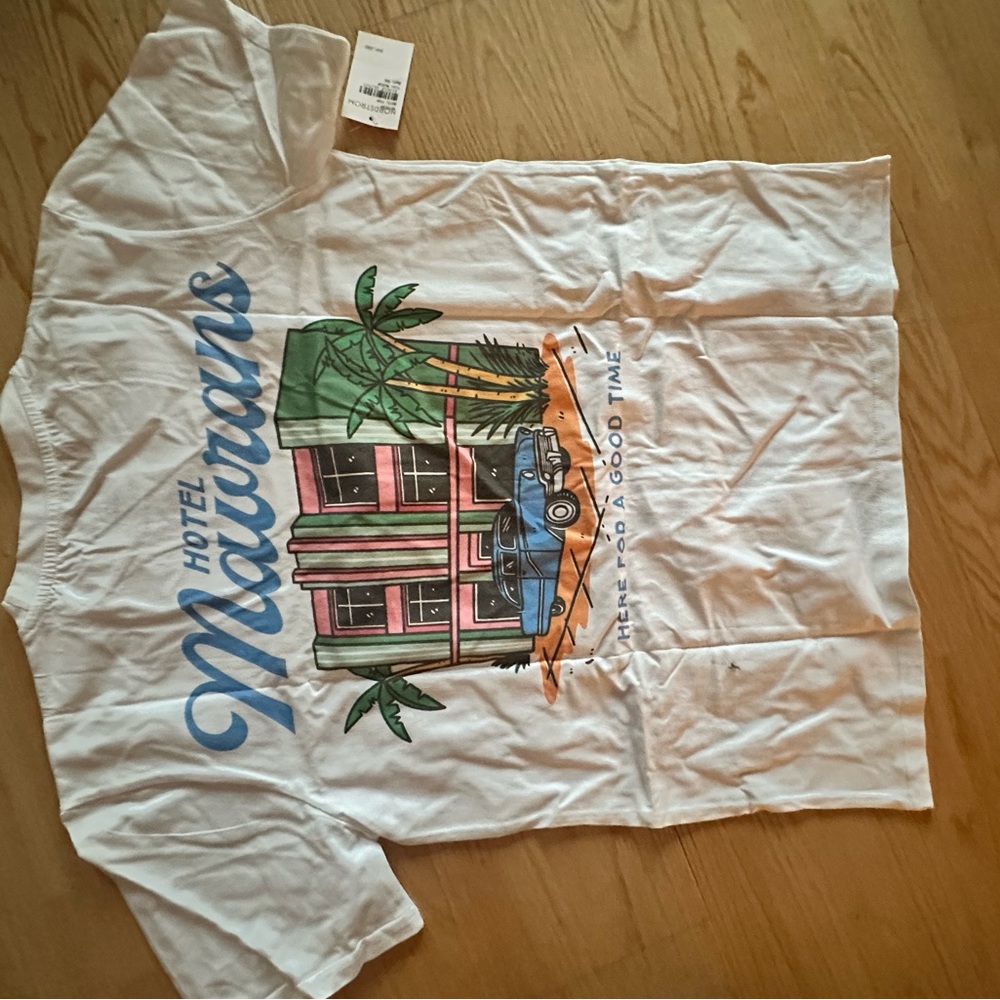 White Graphic Tee with Hotel Motif